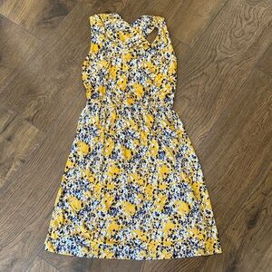 Kaileigh Woman’sYellow Floral Sleeveless Criss Cross back Casual Dress Size -XS